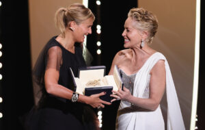 CANNES, FRANCE - JULY 17: Sharon Stone (R) gives Julia Ducournau (L) the Palme d'Or 'Best Movie Award' for 'Titane' during the closing ceremony of the 74th annual Cannes Film Festival on July 17, 2021 in Cannes, France. (Photo by Andreas Rentz/Getty Images)